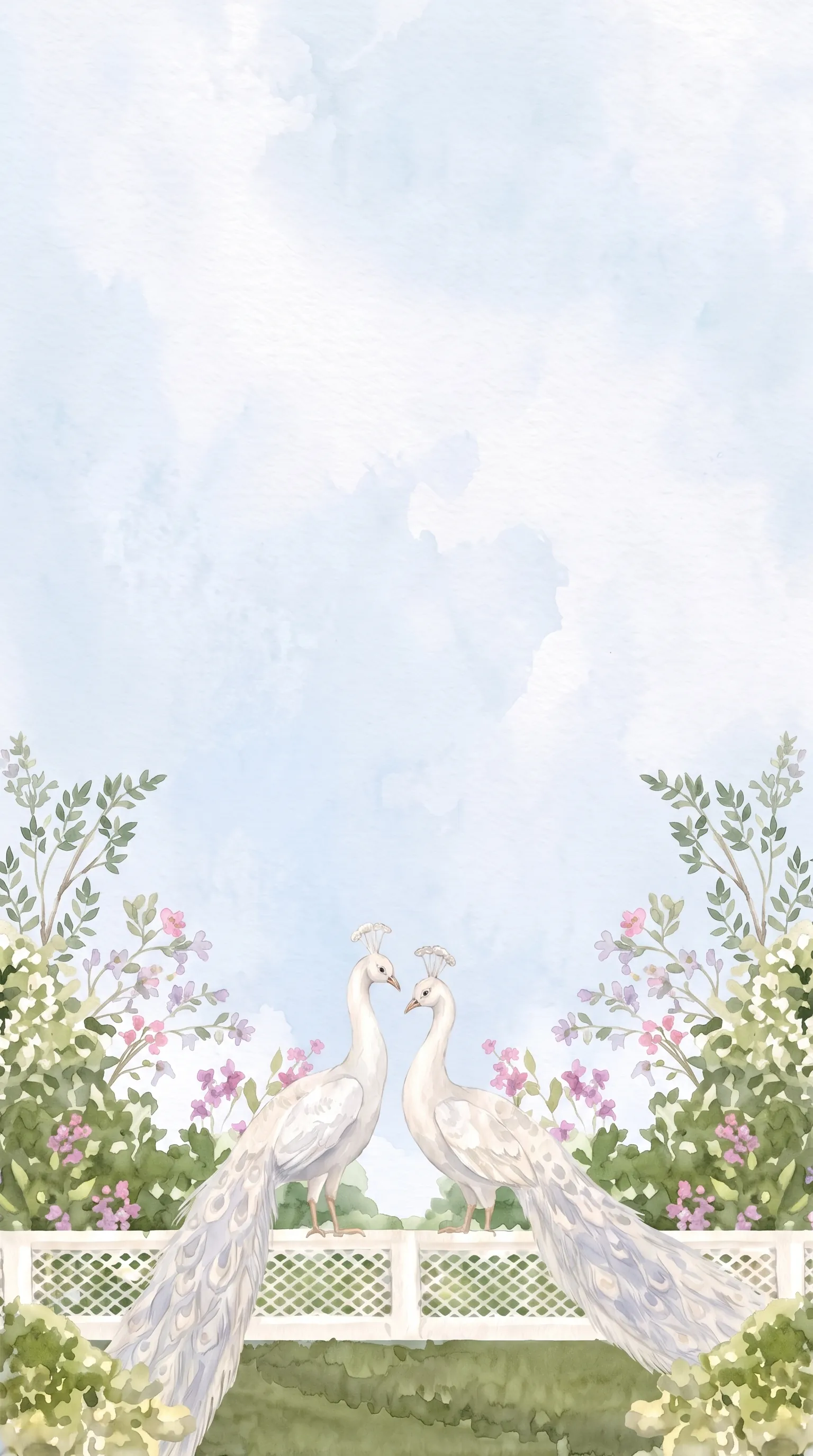 Two white peacocks on a lawn beside a white fence and flower beds